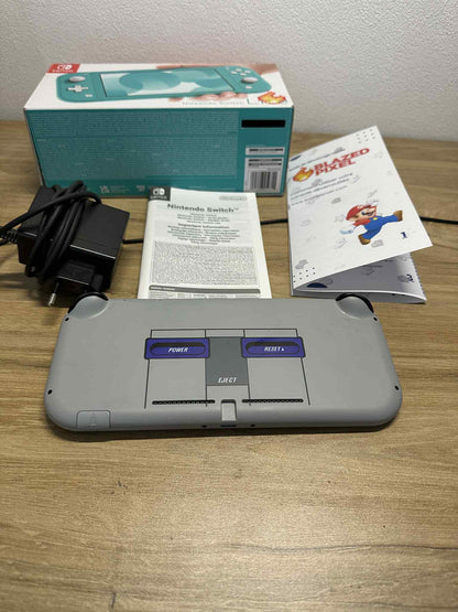 SOLD Nintendo Switch Lite Special SNES Edition – 256 GB + Accessories