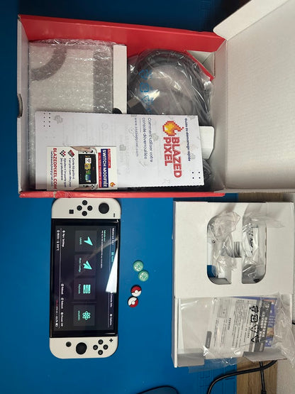 Nintendo Switch OLED Neuve + Carte SD + Jeux