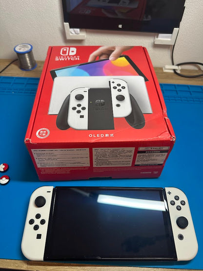 Nintendo Switch OLED Neuve + Carte SD + Jeux
