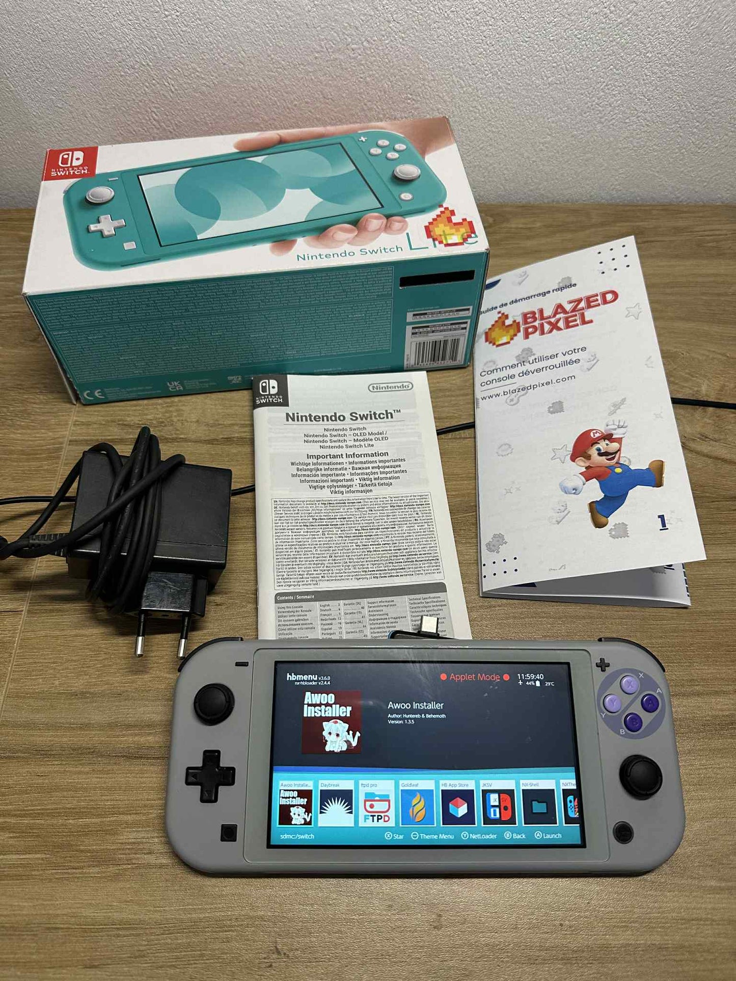 SOLD Nintendo Switch Lite Special SNES Edition – 256 GB + Accessories